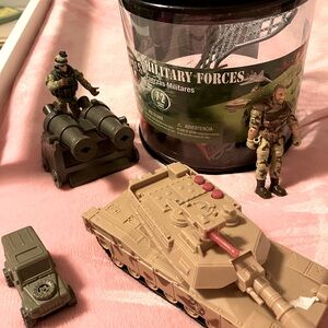 Toy military vehicles and action figures.
